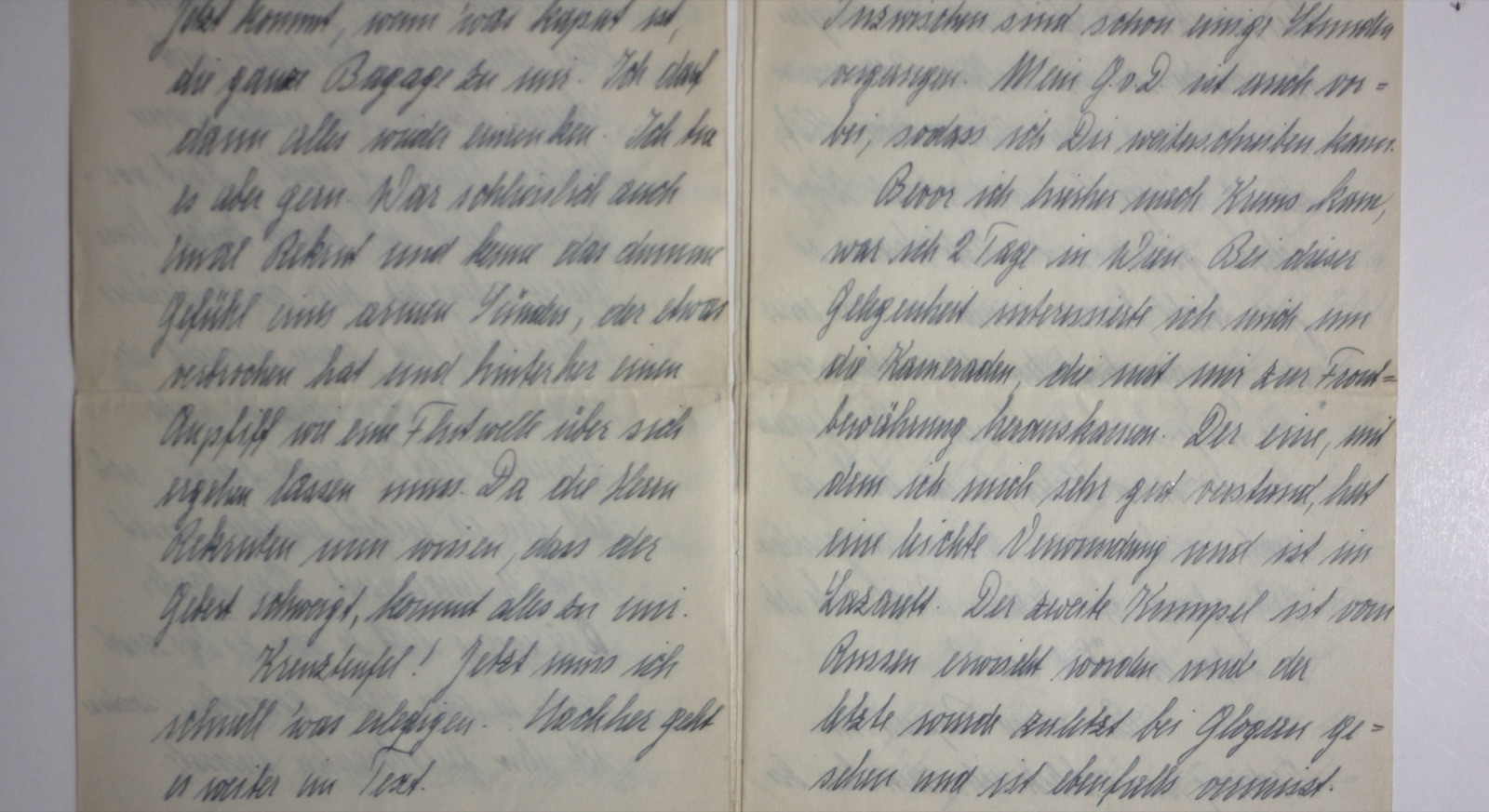 Projection still: handwritten letters in German script